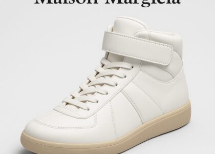 "Maison Margiela Replica fragrance collection displayed on a white marble surface"