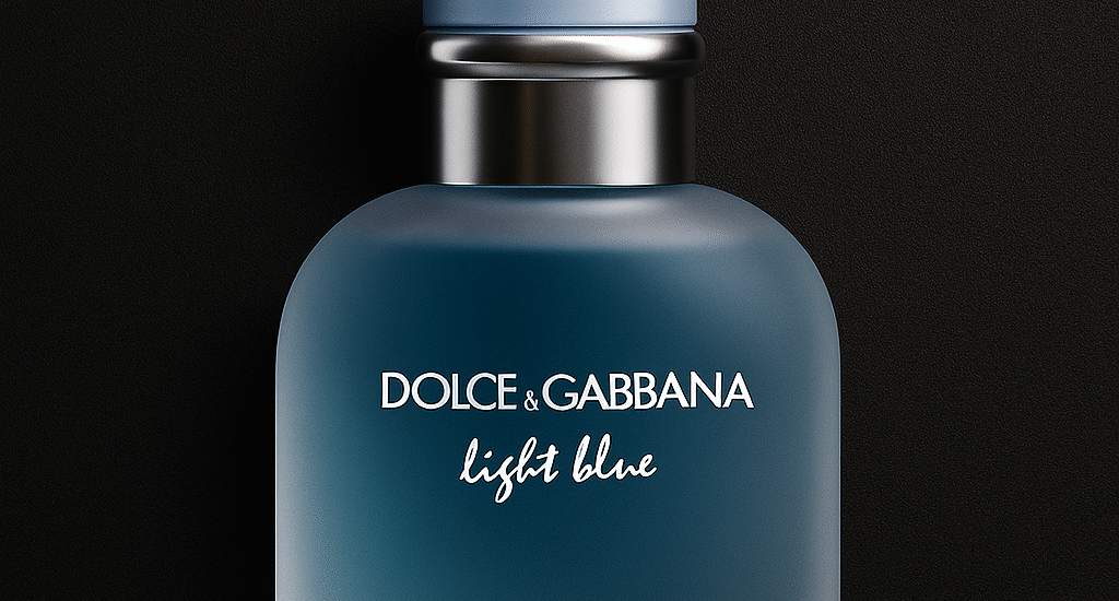 Dolce & Gabbana The One perfume bottle on silk fabric with golden glow.