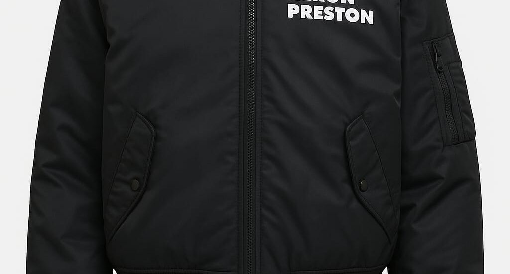 Model wearing Heron Preston streetwear featuring the signature orange tag and Cyrillic graphics
