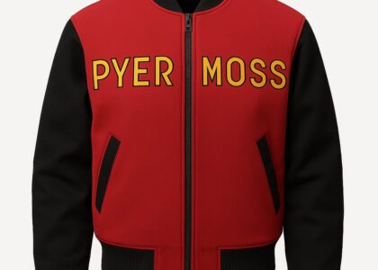 Pyer Moss model walking runway in bold fashion design featuring cultural print and message-driven graphics