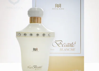 “Rich & Ruitz perfume bottle on a marble surface”