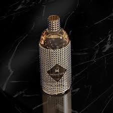 Bottle of Le Monde Sur Mesure perfume by Morreale Paris showcasing elegance and luxury