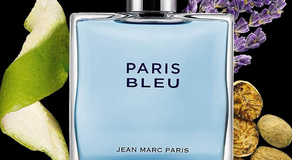 Paris Bleu perfume bottle on a marble vanity with soft Parisian light in the background